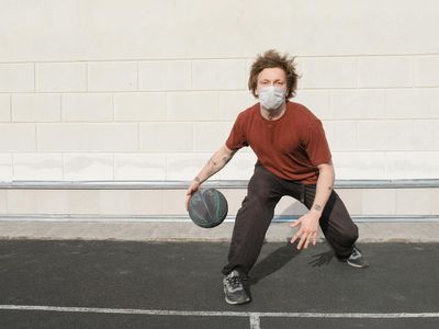 Athletic man focus during a balance exercise