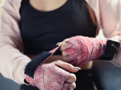 Person hands preparing for a workout session